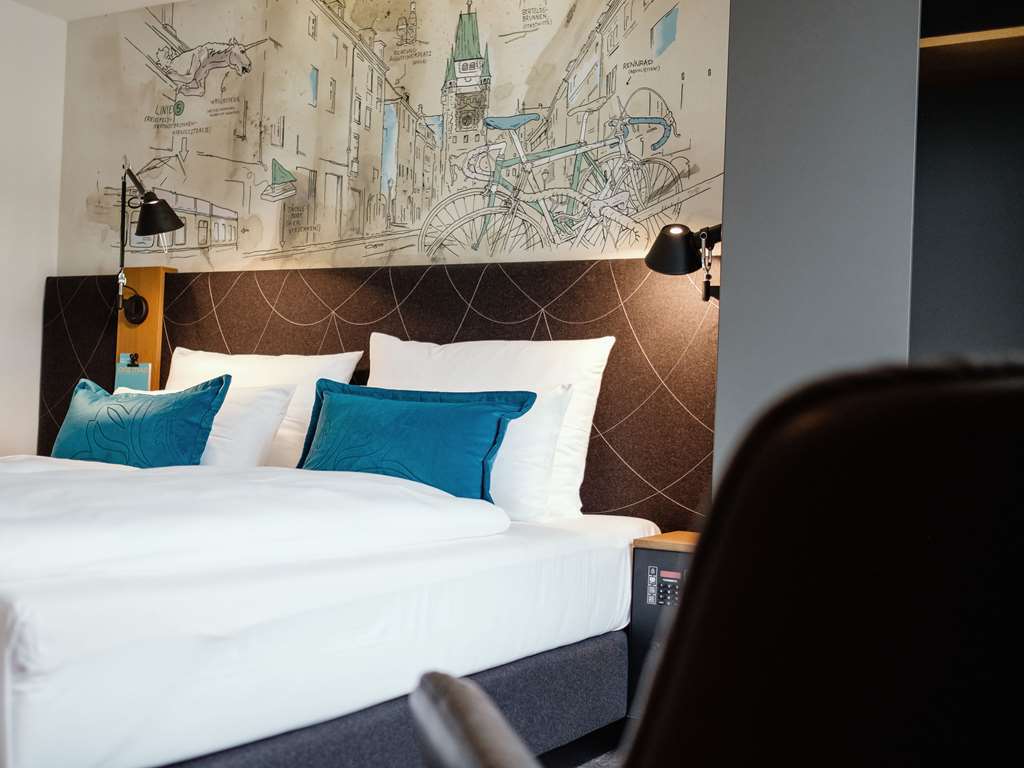 Motel One Freiburg Habitación foto
